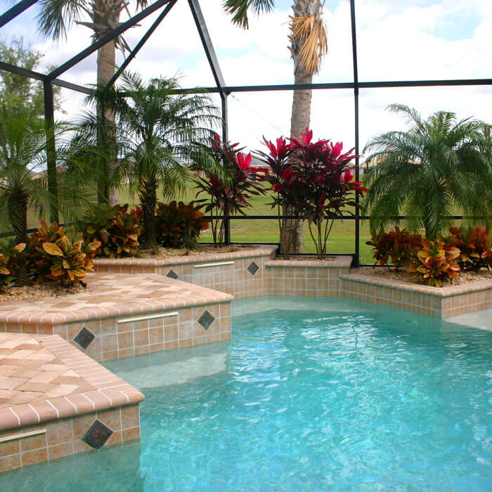 luxury pool in enclosed backyard